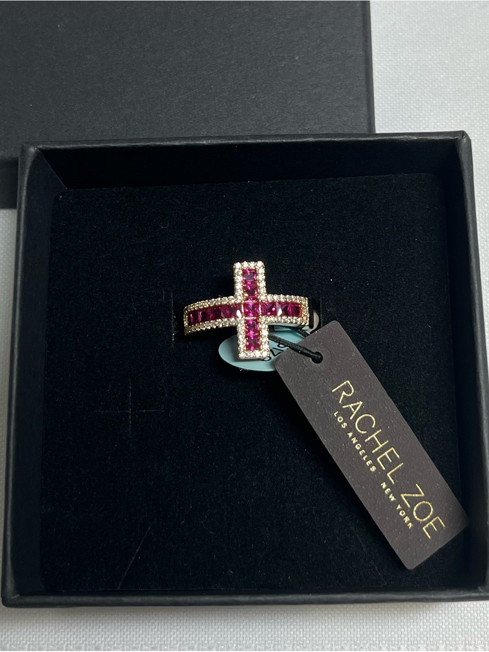 New Rachel Zoe gold plated cross ring with dark pink stones. Size 6.5